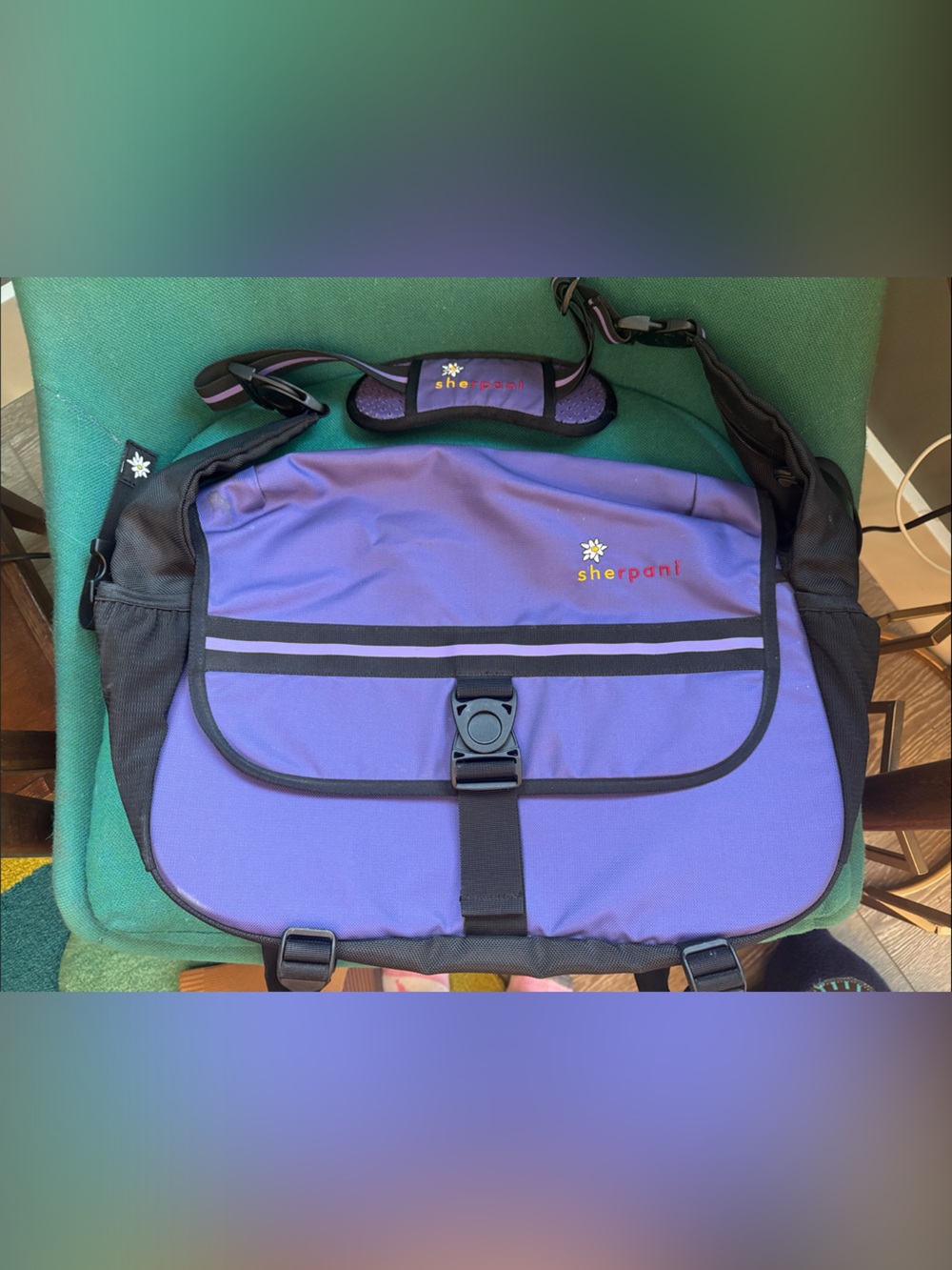 Sherpani Purple Messenger Bag with Daisy print detail and interior